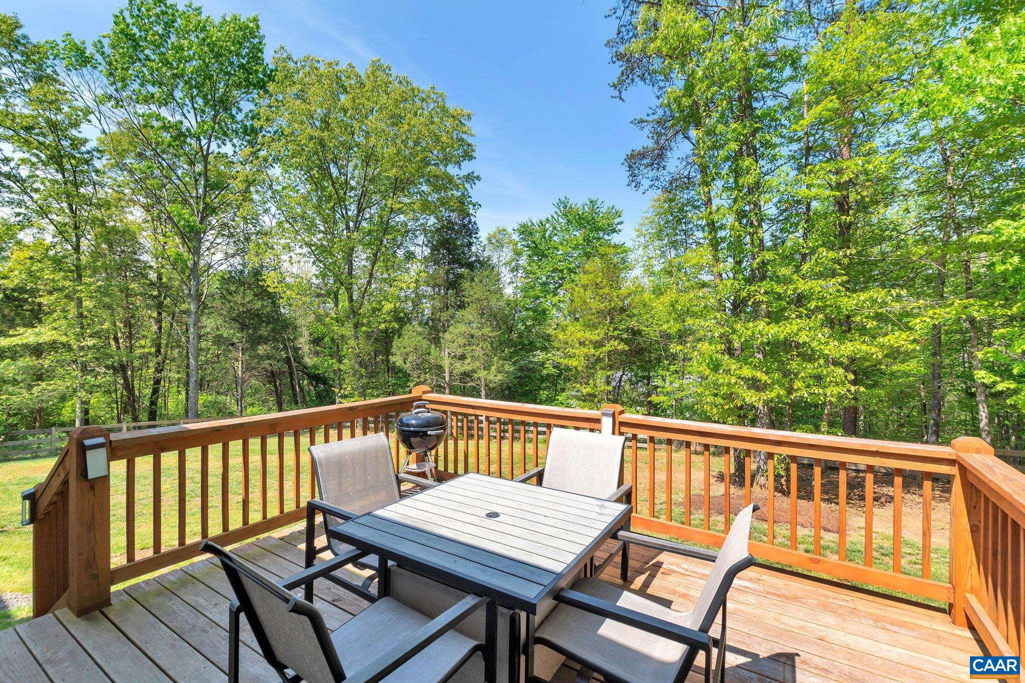 171 Goldenrod Road Ruckersville, VA 22968 - Photo 39 of 45 a view of a two chairs on the deck