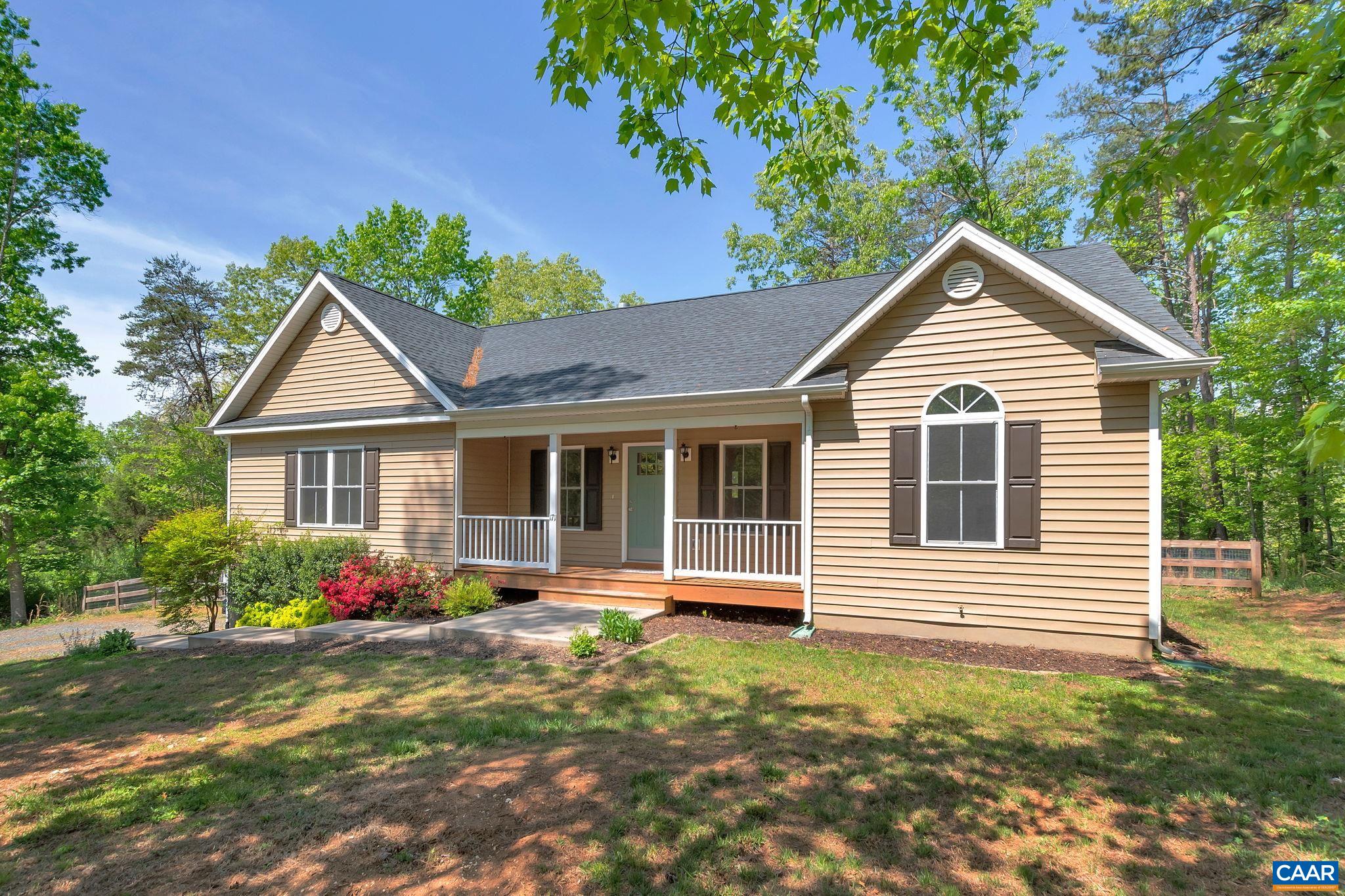 171 Goldenrod Road Ruckersville, VA 22968 - Photo 7 of 45 a front view of a house with garden