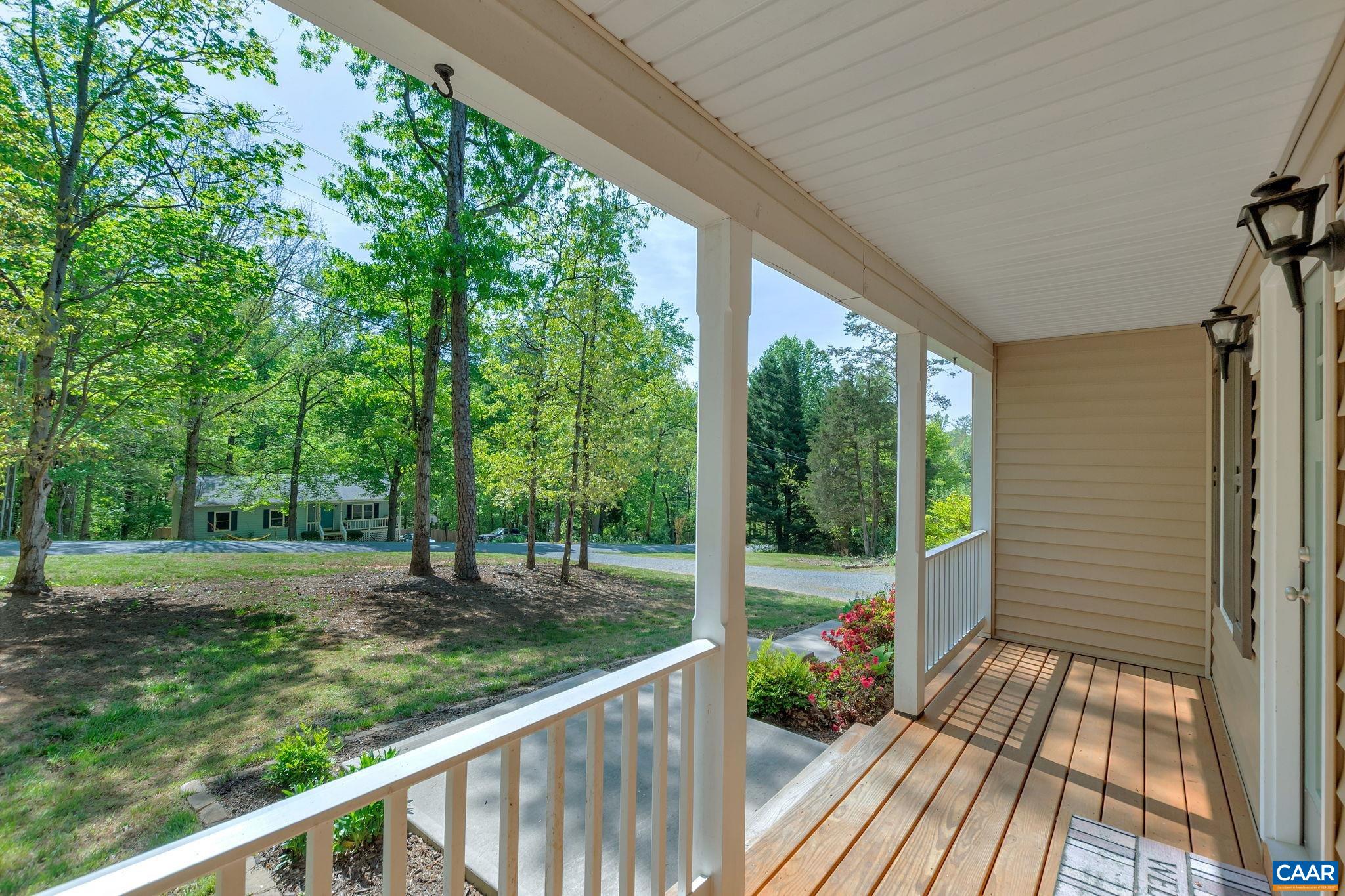 171 Goldenrod Road Ruckersville, VA 22968 - Photo 10 of 45 a view of a porch with wooden floor