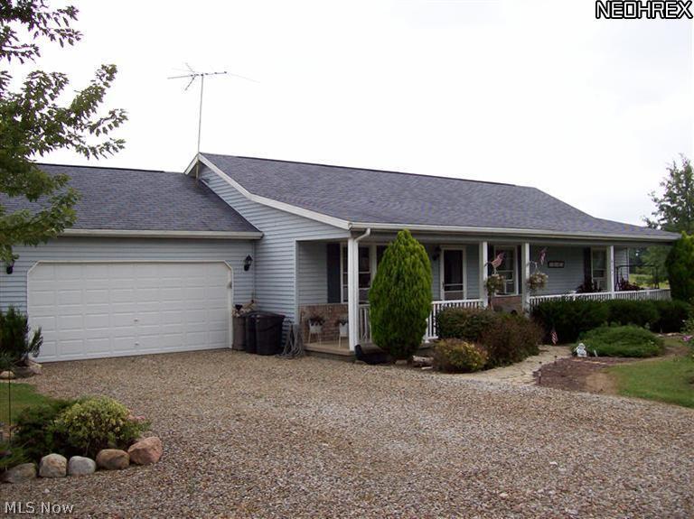 8245 Ruff Road West Salem, OH 44287 - Photo 2 of 25 Another view of the front. Garage door and opener were just replaced 7/2013.