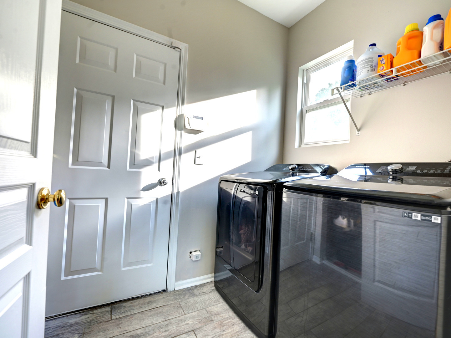 6 Forsythia Court Bolingbrook, IL 60490 - Photo 14 of 28 a kitchen with stainless steel appliances granite countertop a sink and a wooden cabinets