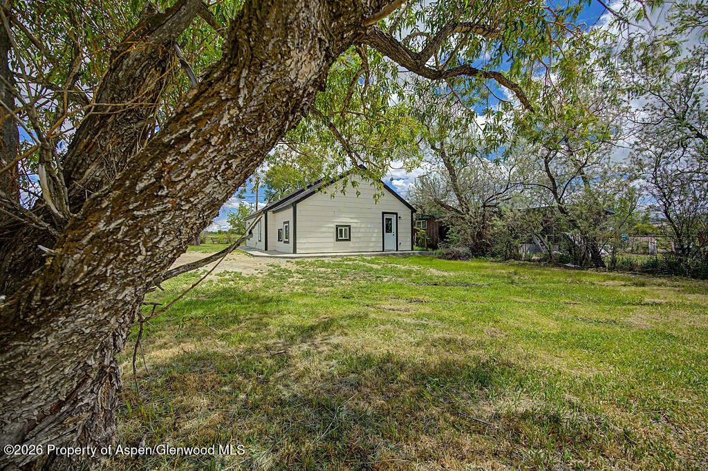 54 South Ranney Street Craig, CO 81625 - Photo 26 of 32 a house view with a garden space