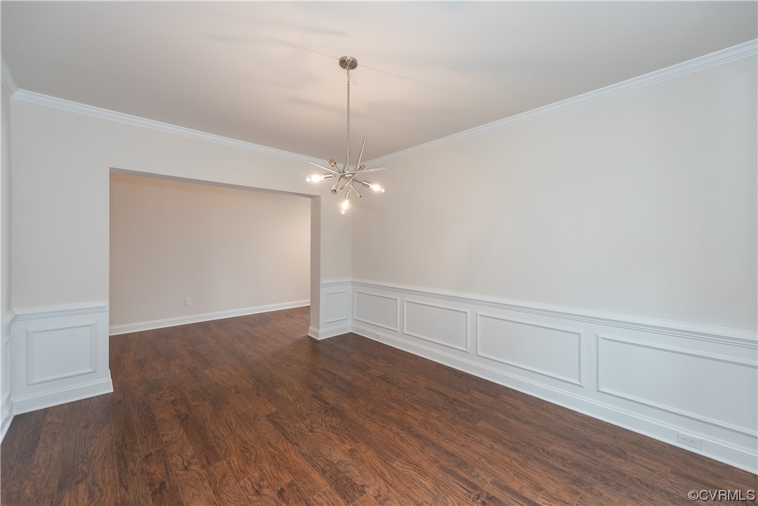 9331 Widthby Road Chesterfield, VA 23832 - Photo 11 of 29 a view of an empty room with wooden floor closet and a window