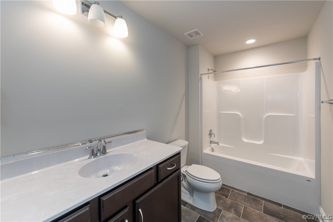 9331 Widthby Road Chesterfield, VA 23832 - Photo 24 of 29 a bathroom with a sink a toilet and shower