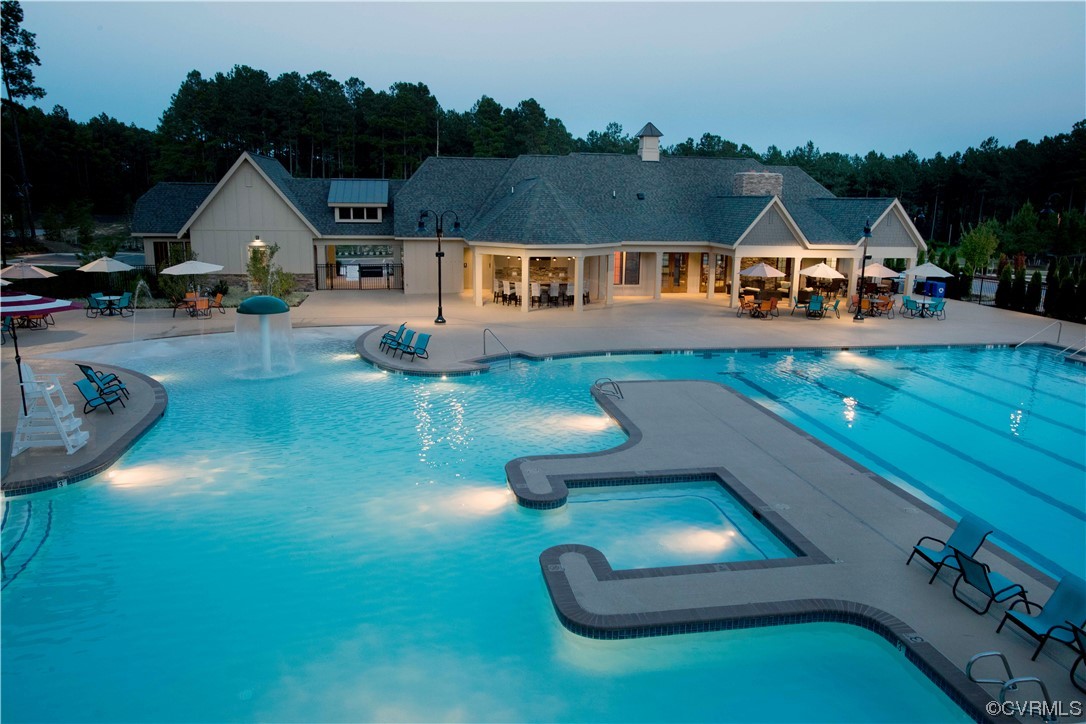 9331 Widthby Road Chesterfield, VA 23832 - Photo 27 of 29 an aerial view of a house with swimming pool garden view and a lake view