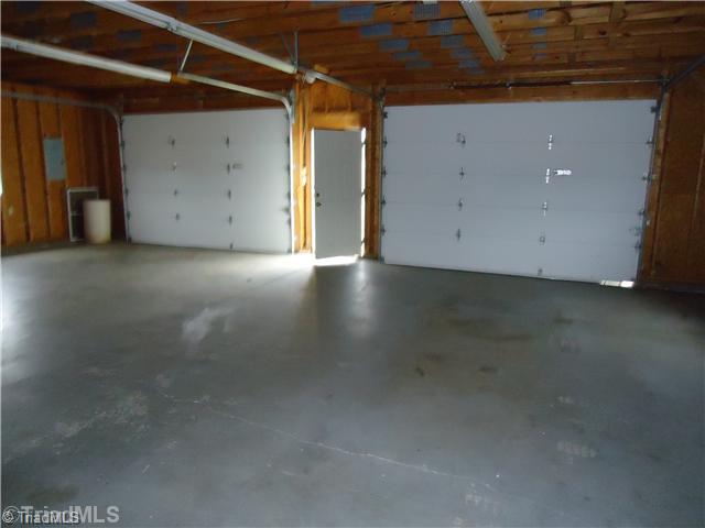 161 Christopher Road Stokesdale, NC 27357 - Photo 5 of 15 Other. Wired Garage with concrete floors and room for workshop or storage