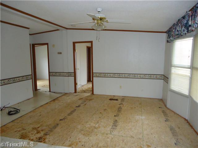 161 Christopher Road Stokesdale, NC 27357 - Photo 9 of 15 Living Room. Carpet has been removed in Living Room and Bedrooms