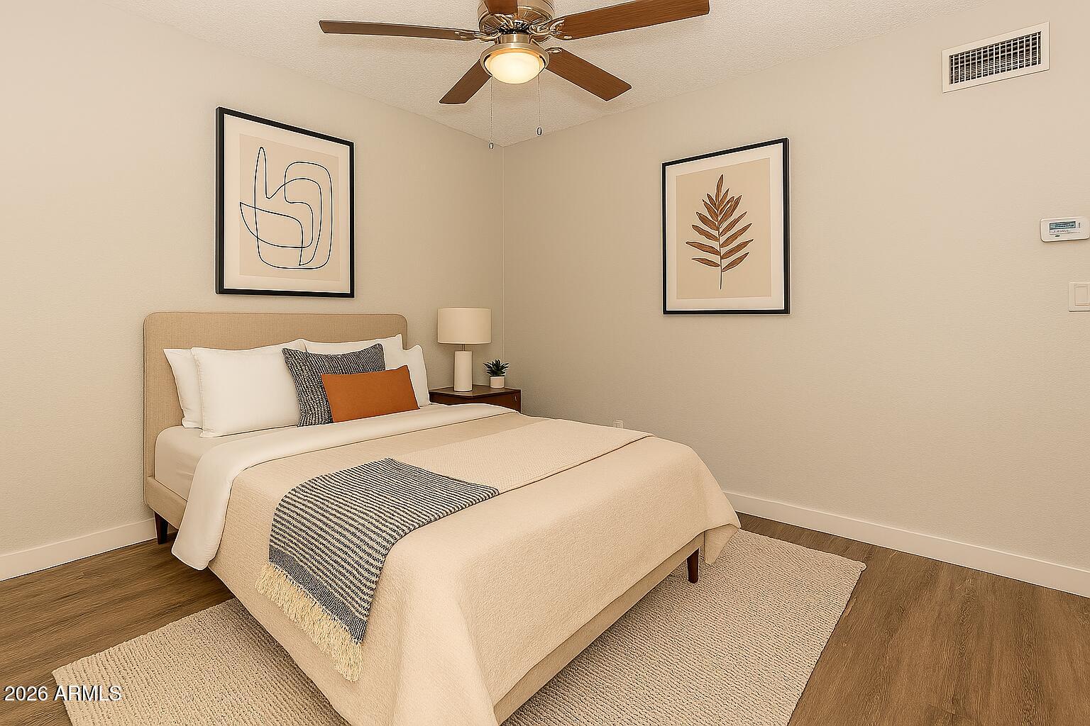 2247 East Cactus Road, Unit 2 Phoenix, AZ 85022 - Photo 5 of 15 5 Staged Guest Bedroom
