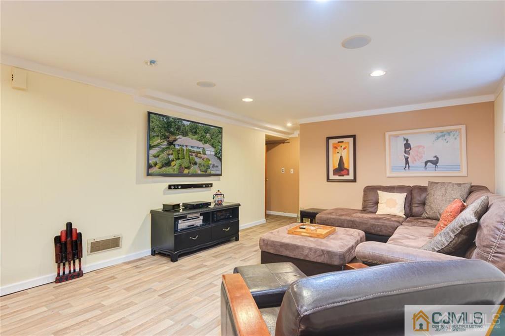 5 Herron Road Edison, NJ 08820 - Photo 30 of 42 a living room with furniture and wooden floor