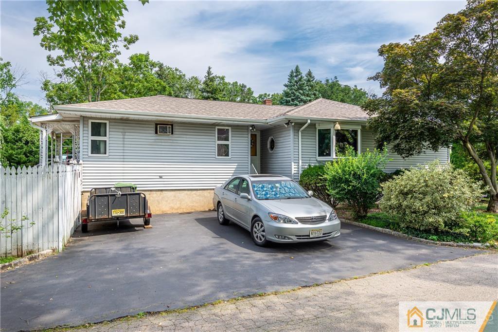5 Herron Road Edison, NJ 08820 - Photo 42 of 42 a front view of a house with a yard