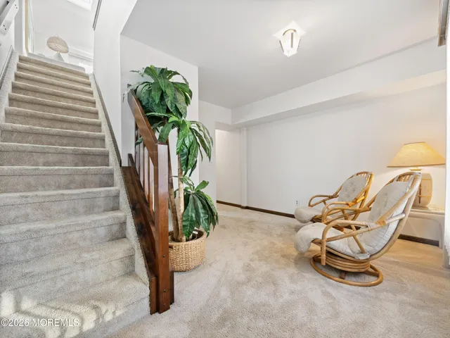 a bedroom with a bed and a mirror