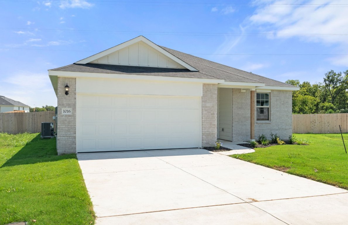 1016 Kerr Court Temple, TX 76501 - Photo 2 of 15 a front view of a house with a yard