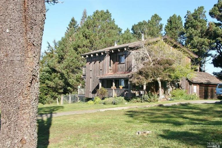33396 Albion Ridge Road Albion, CA 95410 - Photo 1 of 1 a front view of a house with a yard
