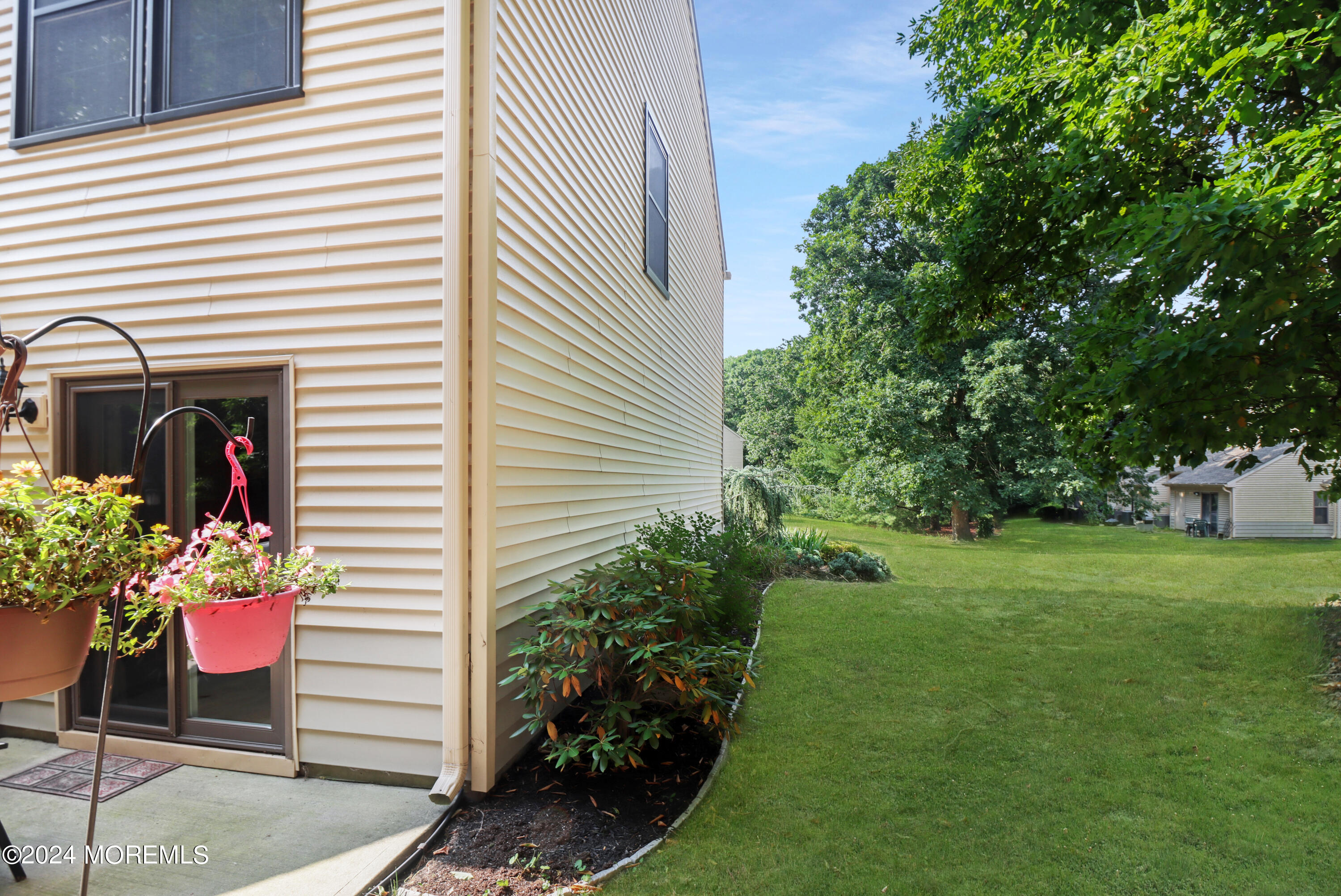 100 Whispering Oaks Way Jackson, NJ 08527 - Photo 12 of 56 a view of a house with a backyard