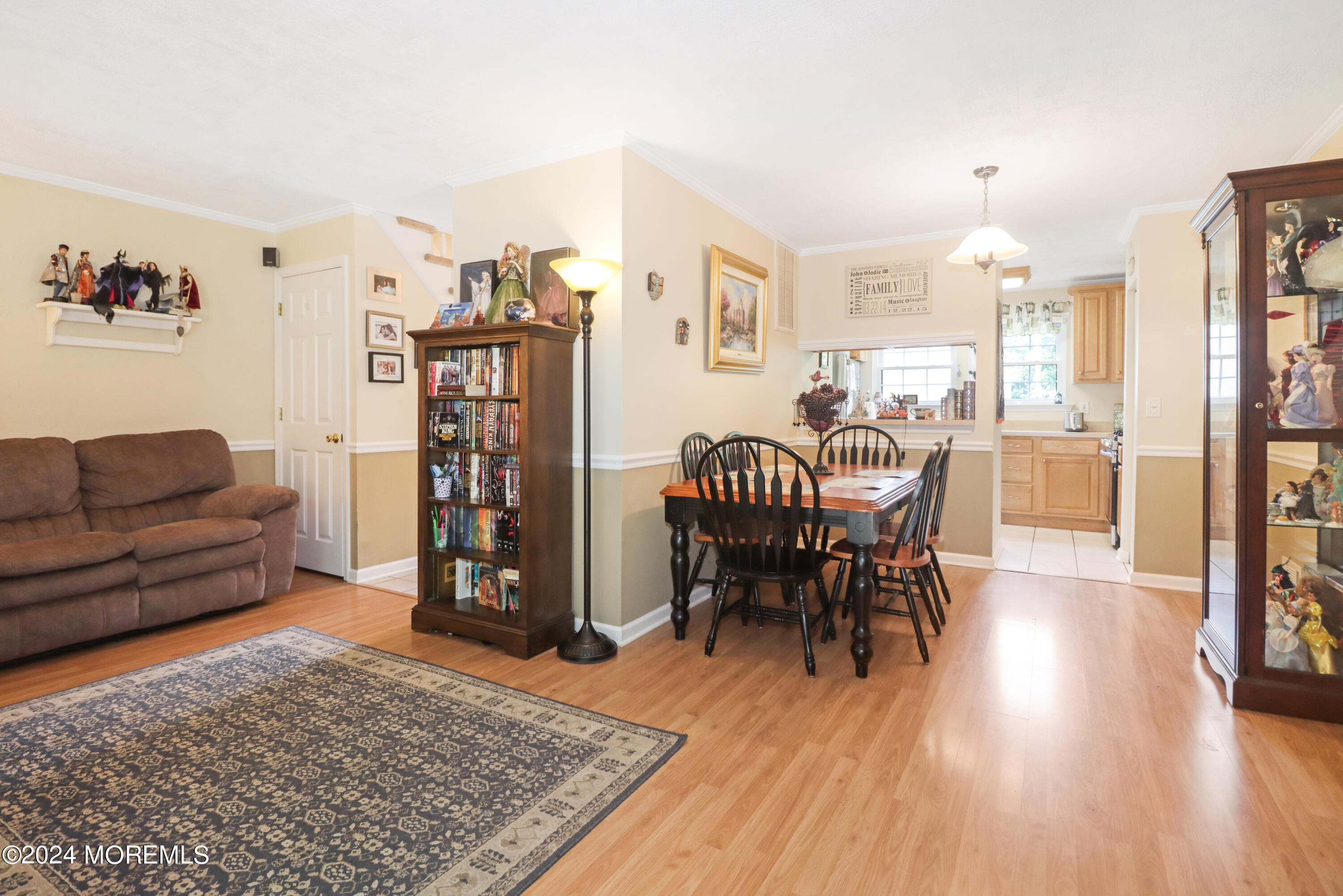 100 Whispering Oaks Way Jackson, NJ 08527 - Photo 22 of 56 a living room with furniture and wooden floor
