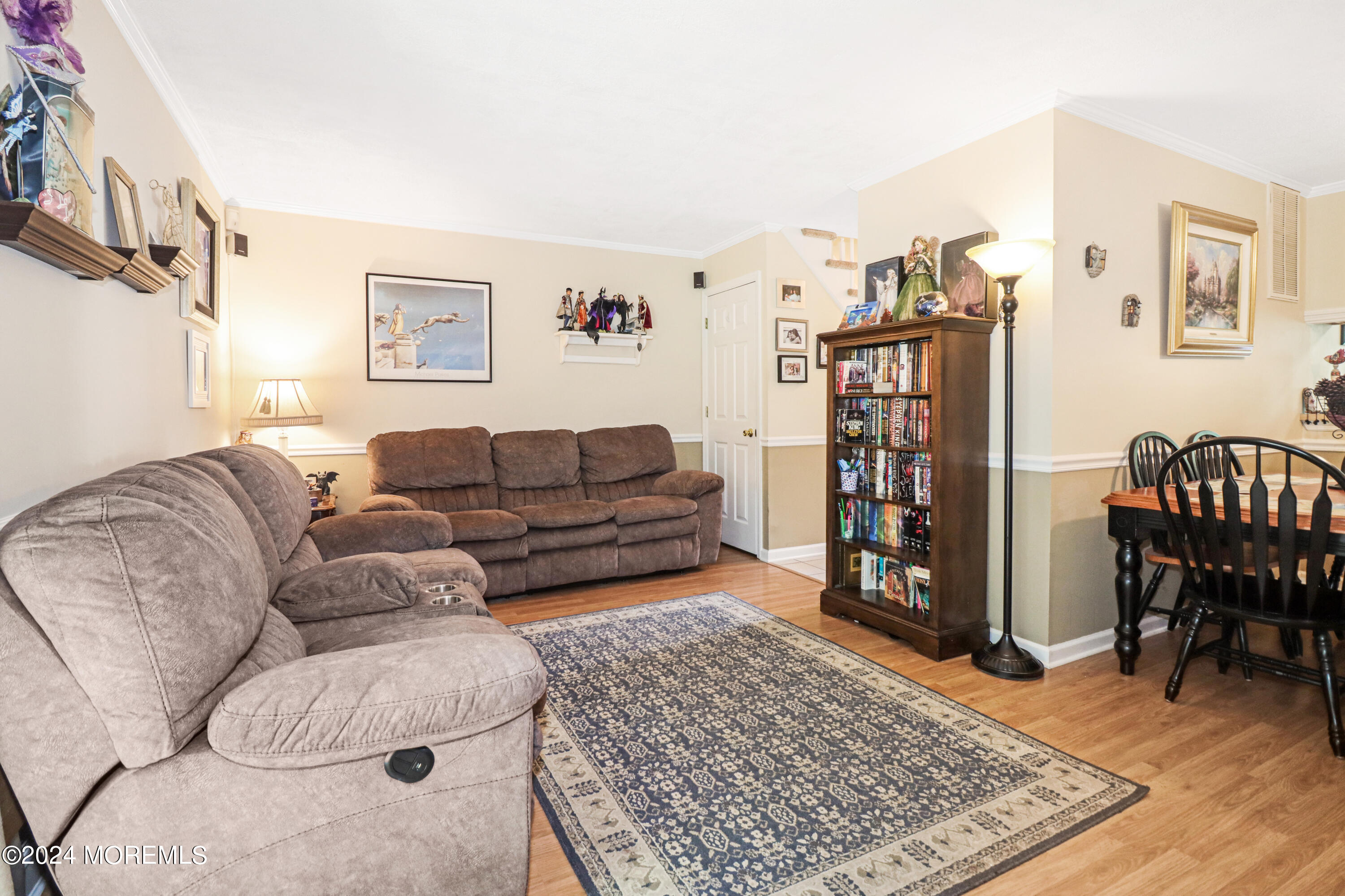 100 Whispering Oaks Way Jackson, NJ 08527 - Photo 23 of 56 a living room with furniture and a rug