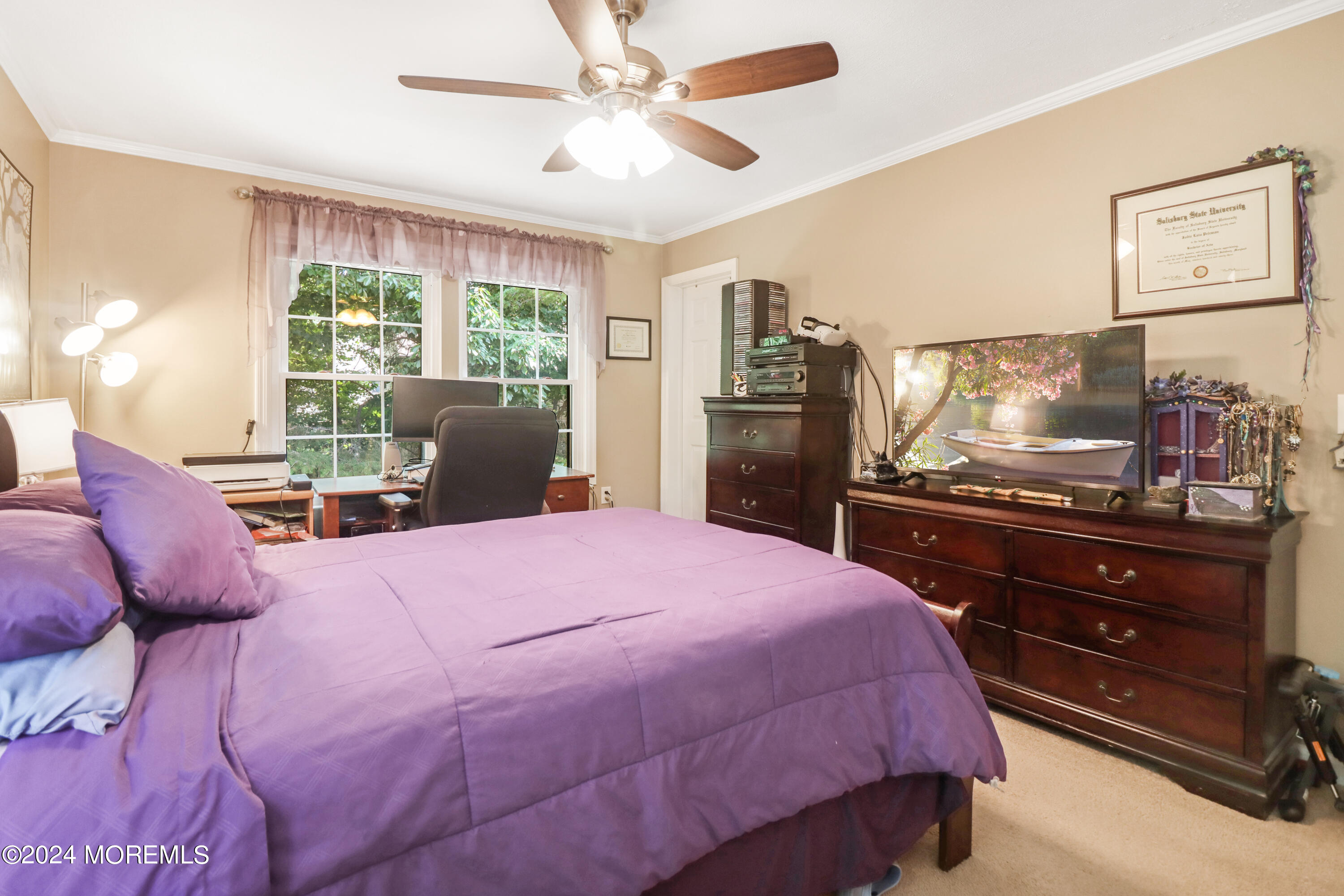 100 Whispering Oaks Way Jackson, NJ 08527 - Photo 30 of 56 a bedroom with a bed and a flat screen tv