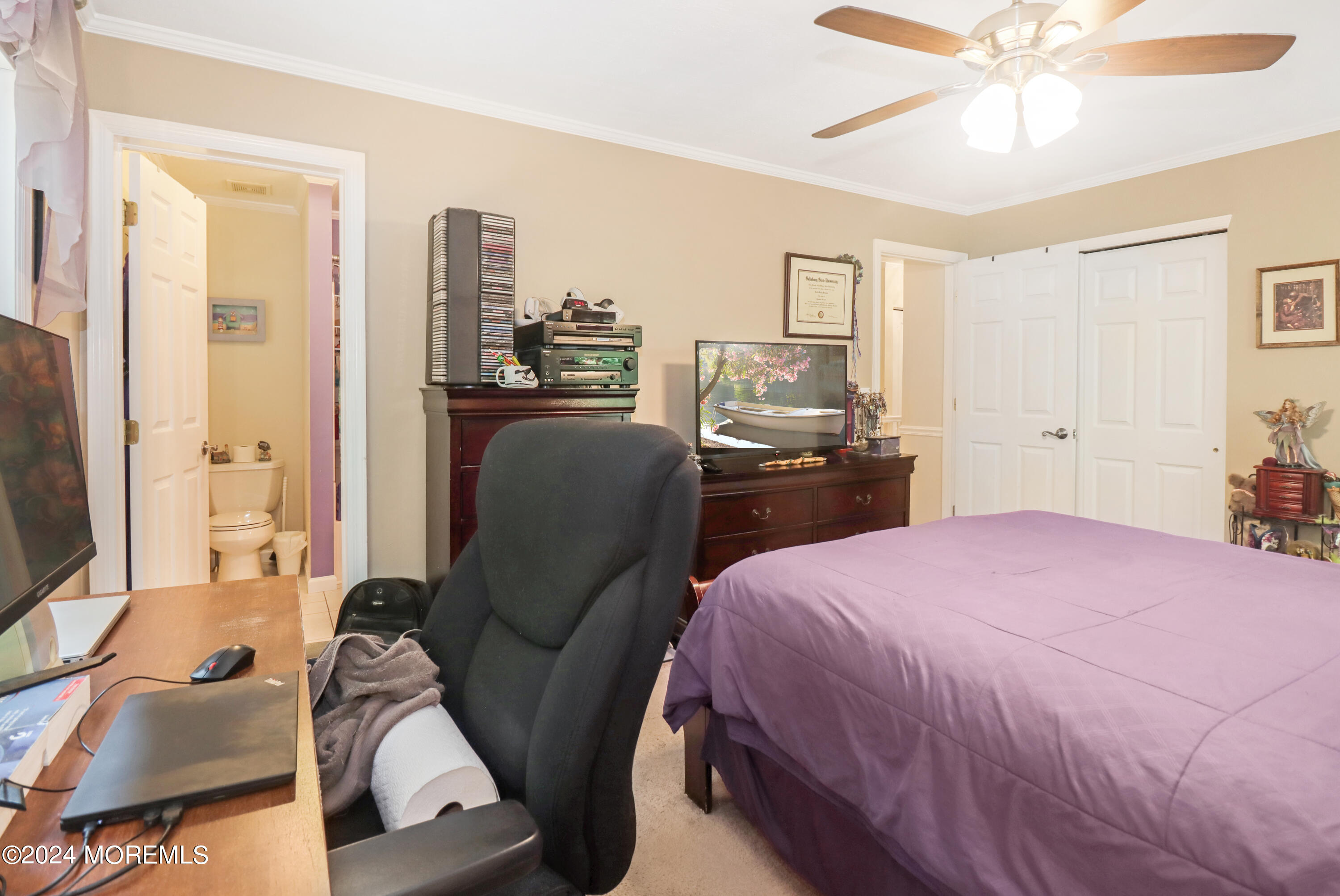 100 Whispering Oaks Way Jackson, NJ 08527 - Photo 31 of 56 a bedroom with a bed and furniture