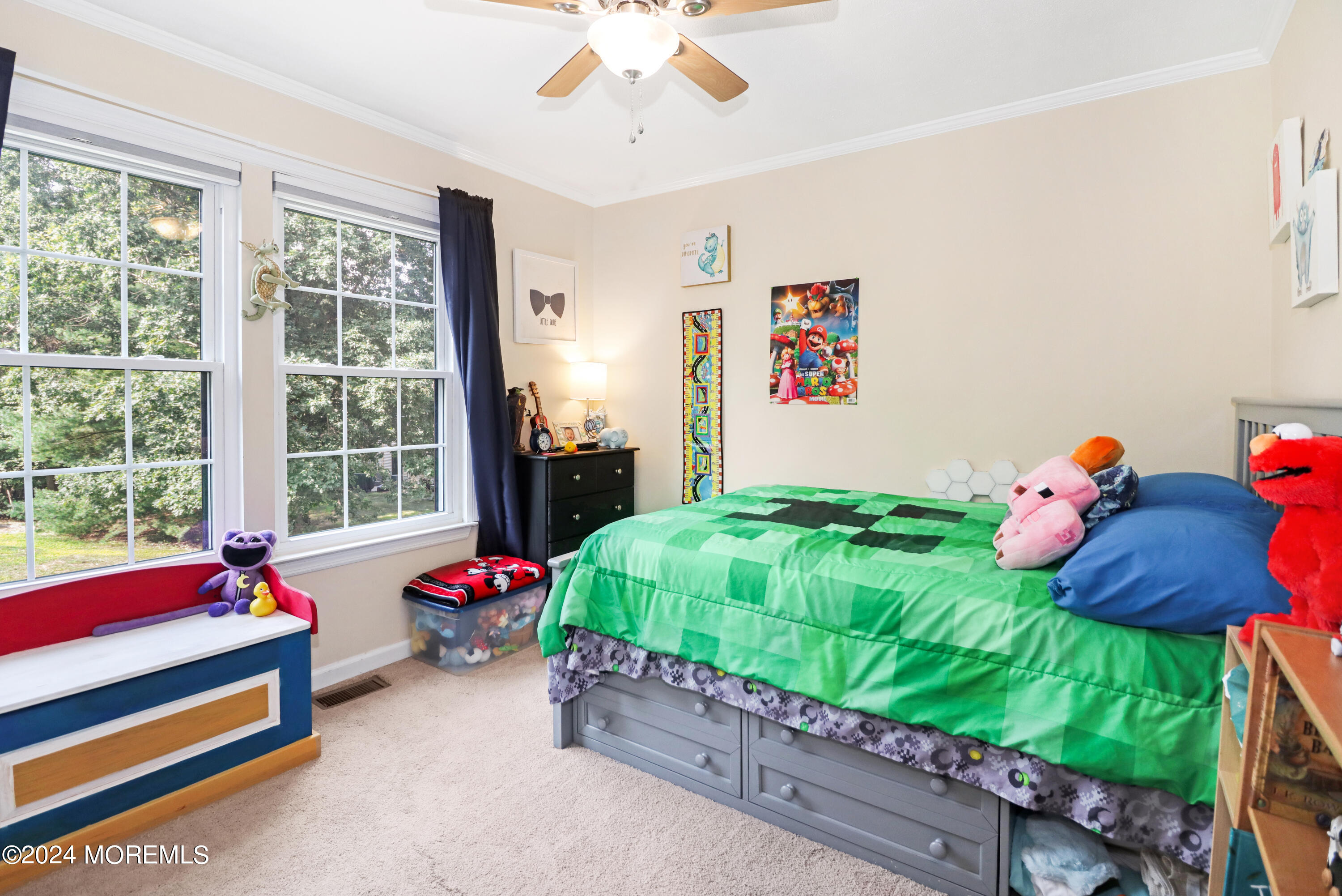 100 Whispering Oaks Way Jackson, NJ 08527 - Photo 32 of 56 a bedroom with a bed and a window