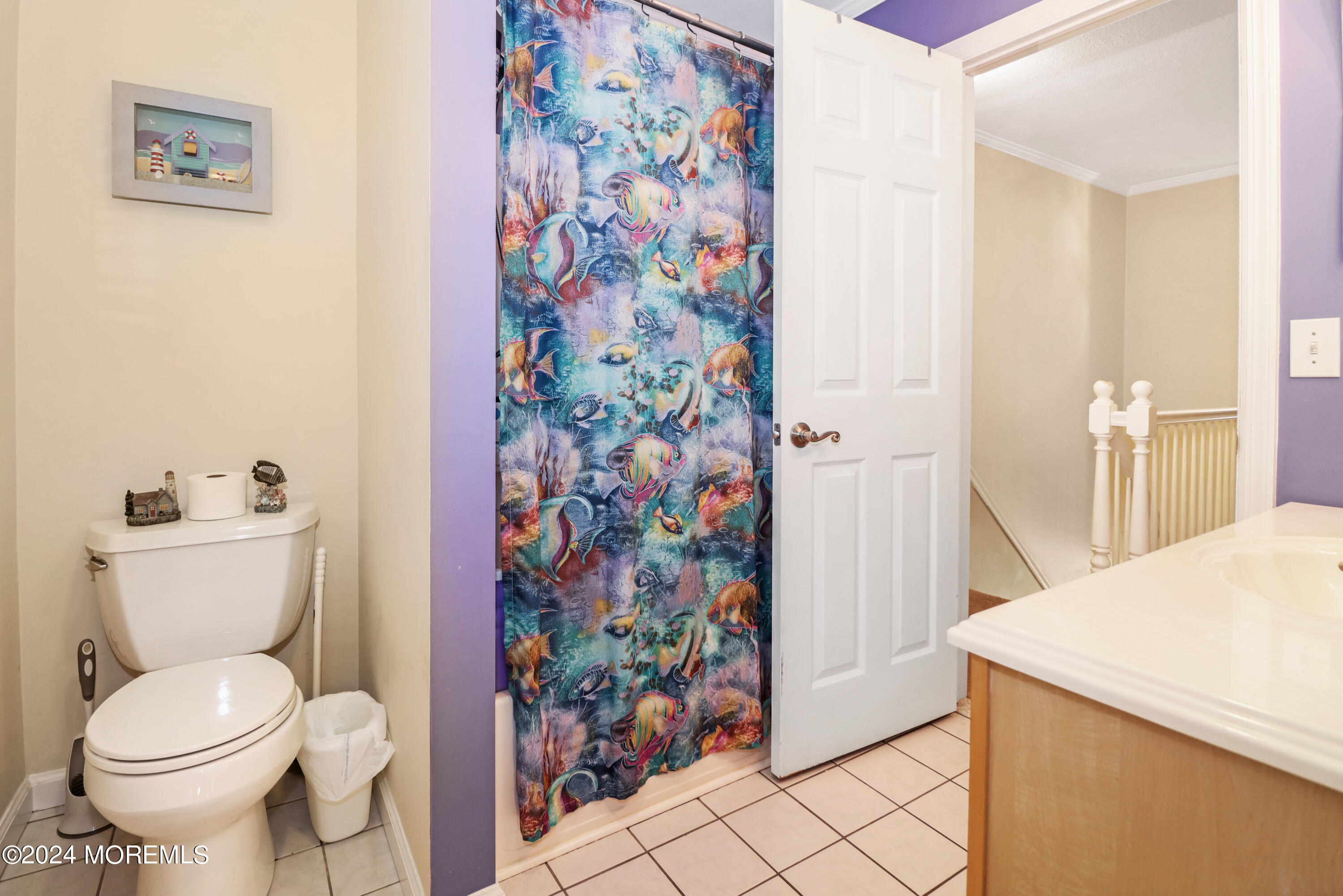 100 Whispering Oaks Way Jackson, NJ 08527 - Photo 35 of 56 a bathroom with a toilet and a shower curtain