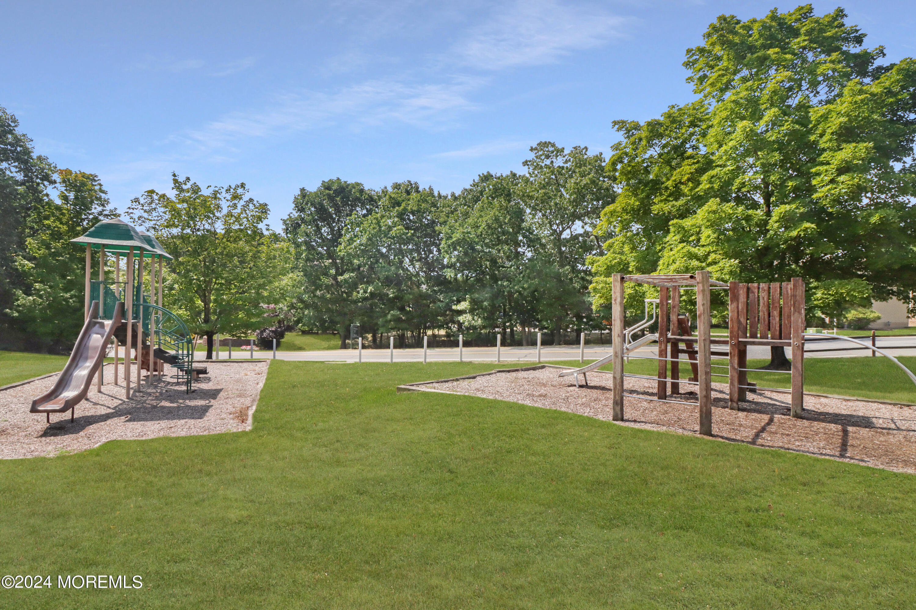 100 Whispering Oaks Way Jackson, NJ 08527 - Photo 46 of 56 a view of a park with swings