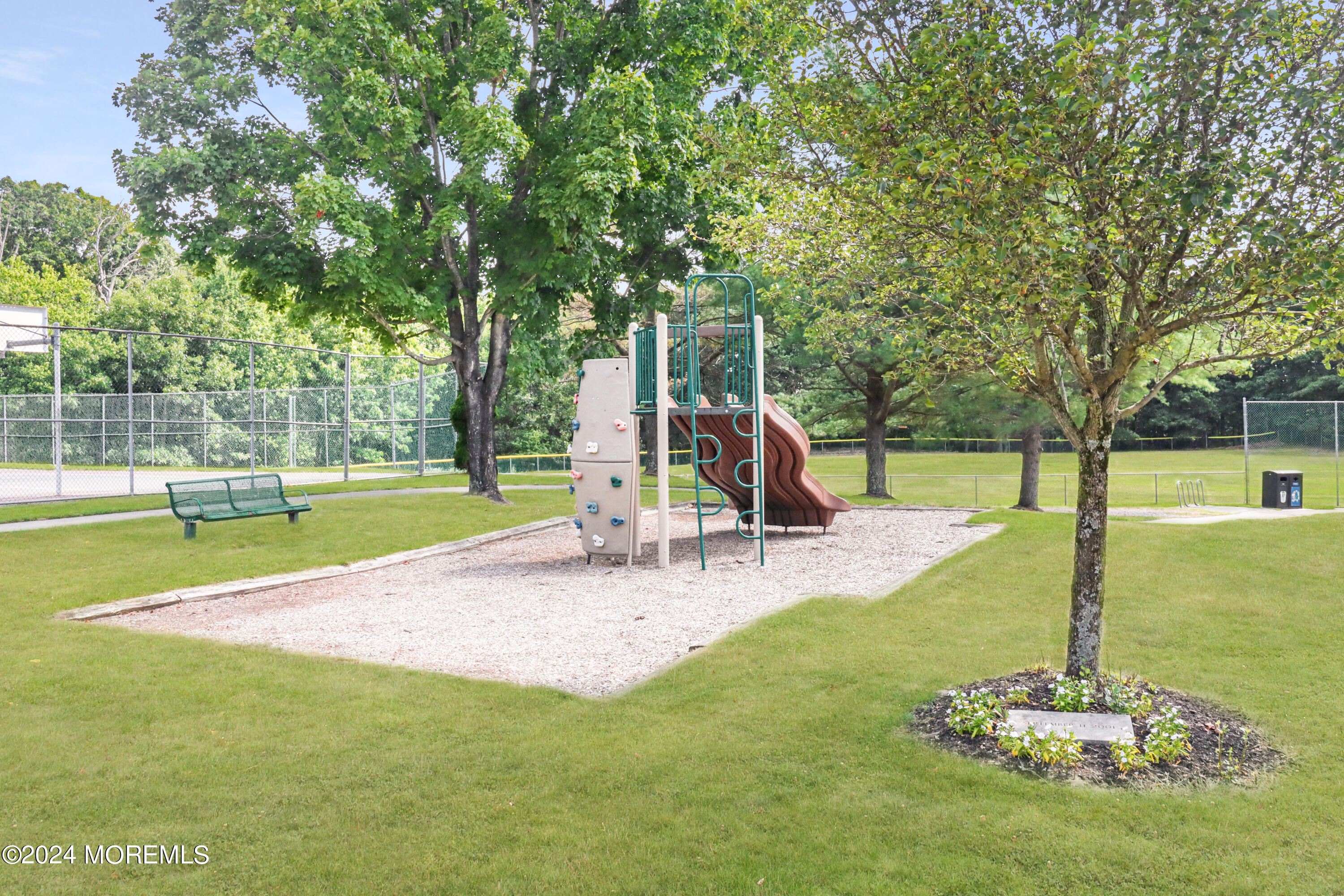 100 Whispering Oaks Way Jackson, NJ 08527 - Photo 47 of 56 a view of a park with swings