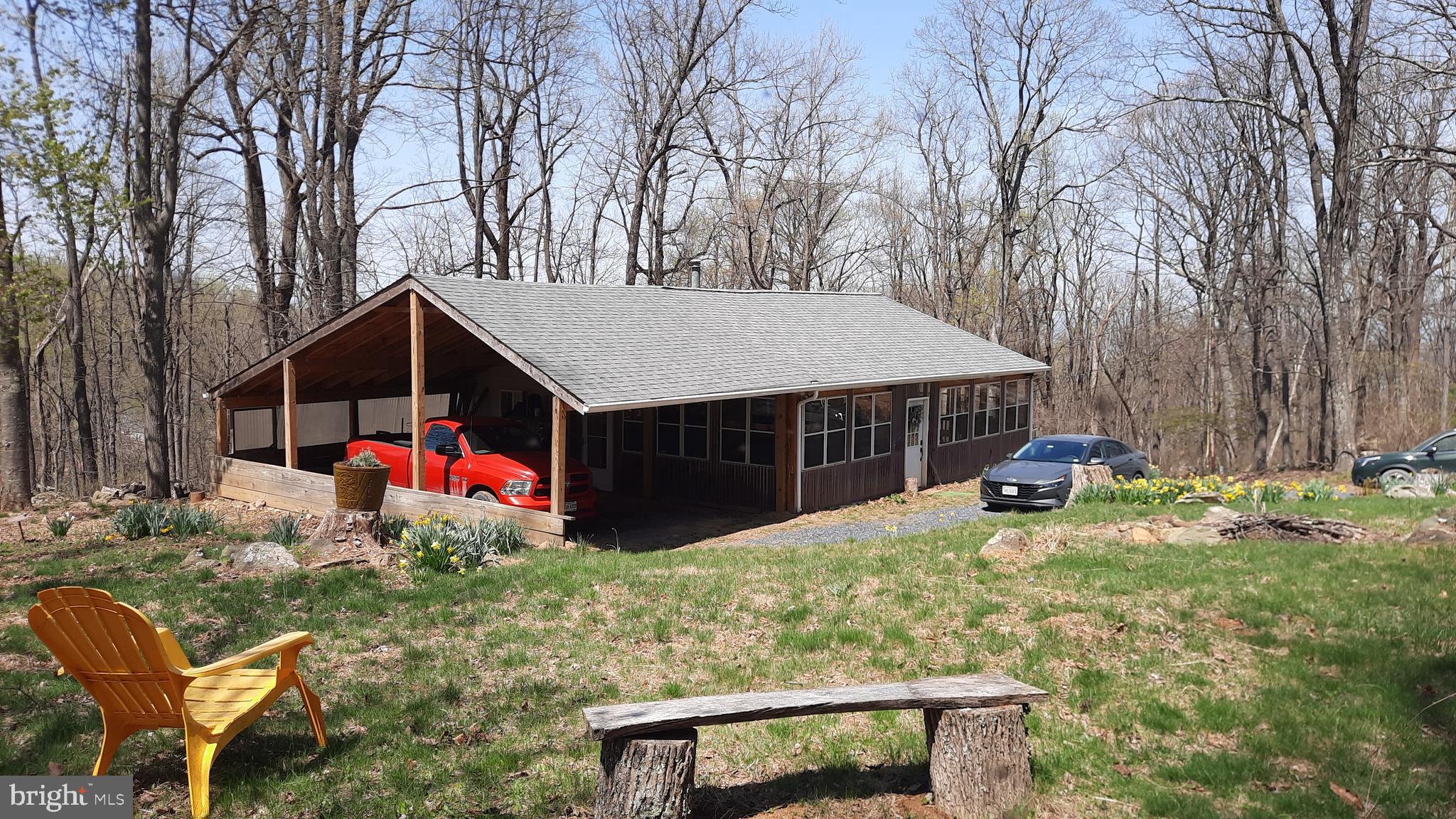 2478 High Top Road Linden, VA 22642 - Photo 36 of 36 a backyard of a house with table and chairs