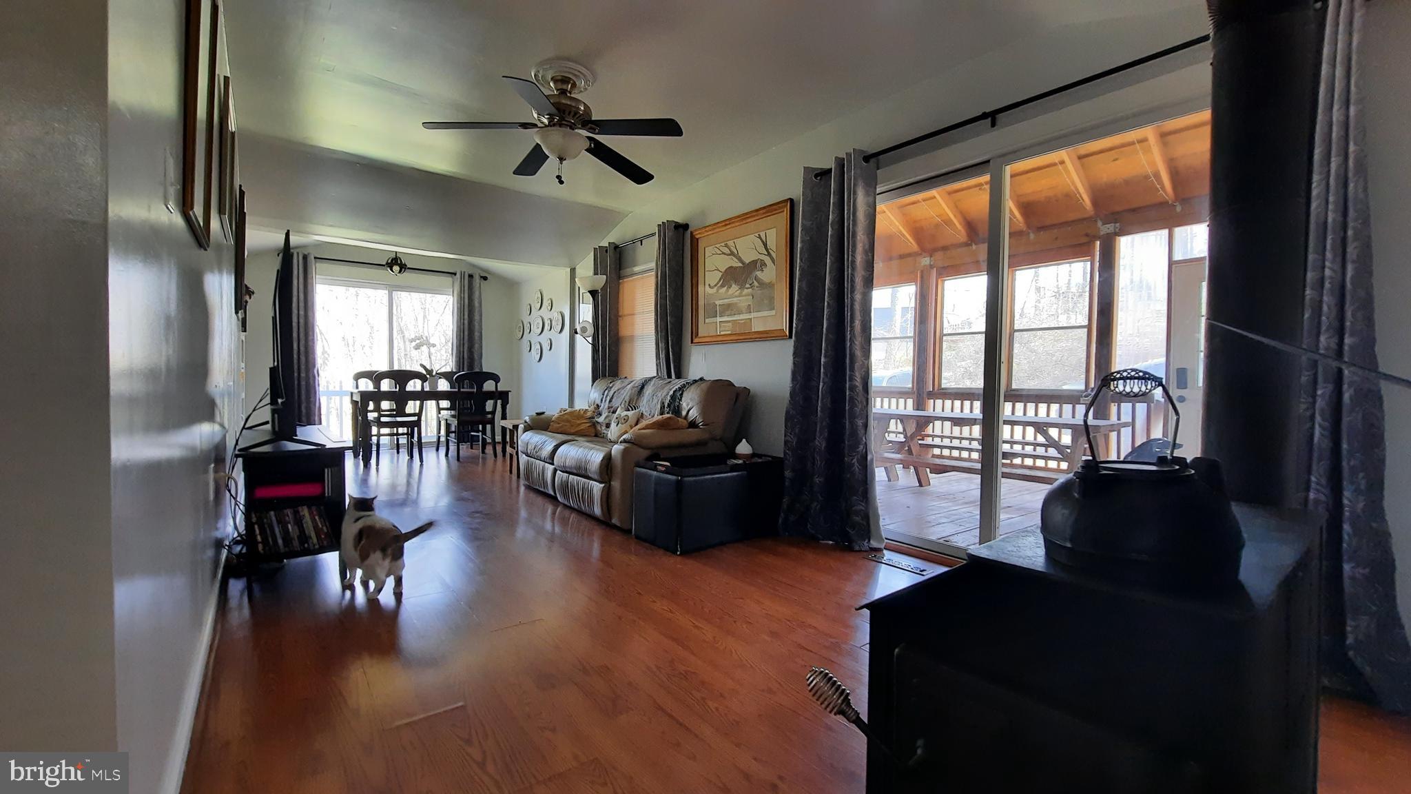2478 High Top Road Linden, VA 22642 - Photo 8 of 36 a living room with furniture and a large window