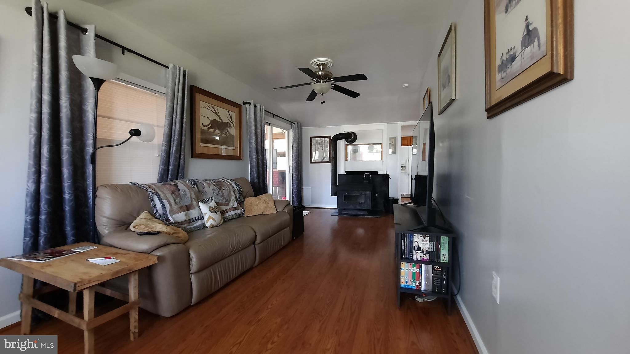 2478 High Top Road Linden, VA 22642 - Photo 9 of 36 a living room with furniture and a wooden floor