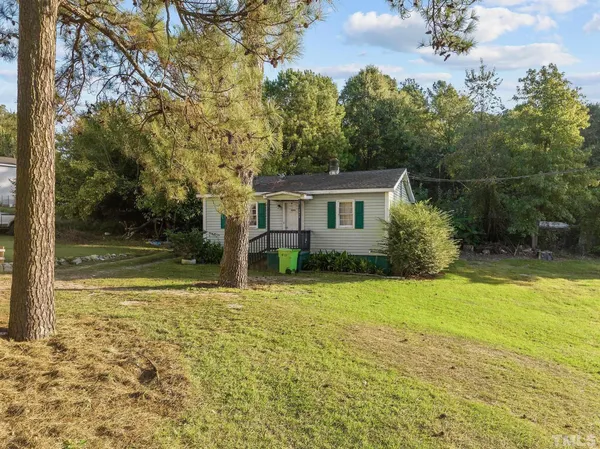 a house view with a backyard space