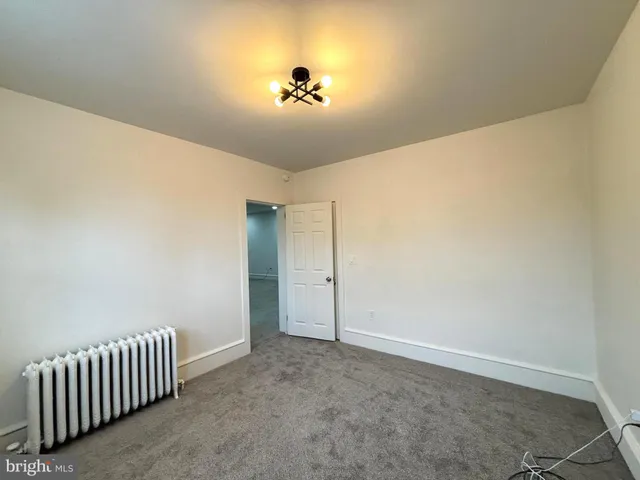 an empty room with a workbench