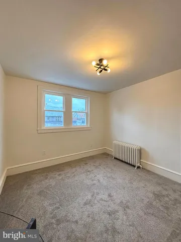 a view of a room with a window