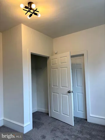 a view of a livingroom with a ceiling fan