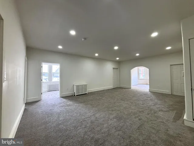 a kitchen with granite countertop a sink and a window