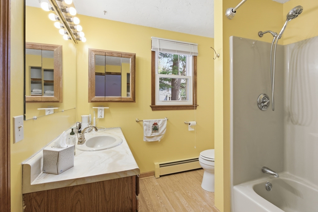 19 Mockingbird Lane Maynard, MA 01754 - Photo 24 of 34 a bathroom with a sink a toilet and shower