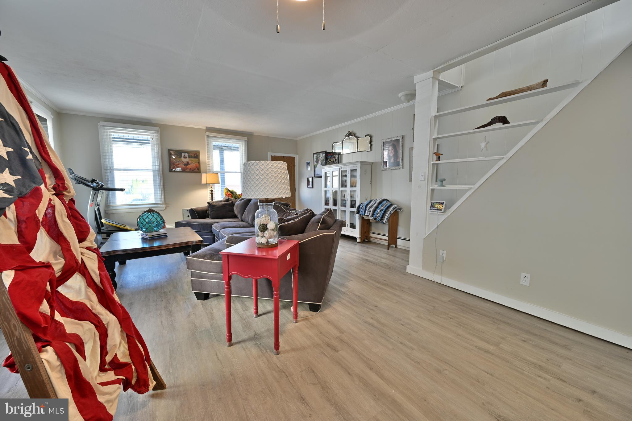 24734 East Main Street Columbus, NJ 08022 - Photo 5 of 24 a living room with furniture and a wooden floor