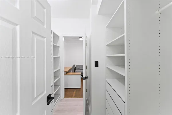 a bathroom with a bathtub and shower