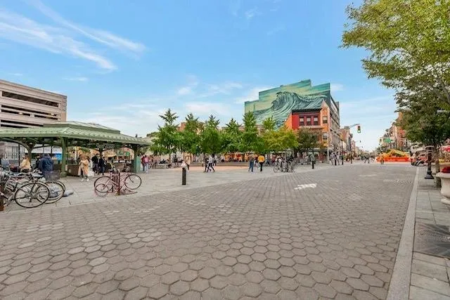 a view of a street with cars