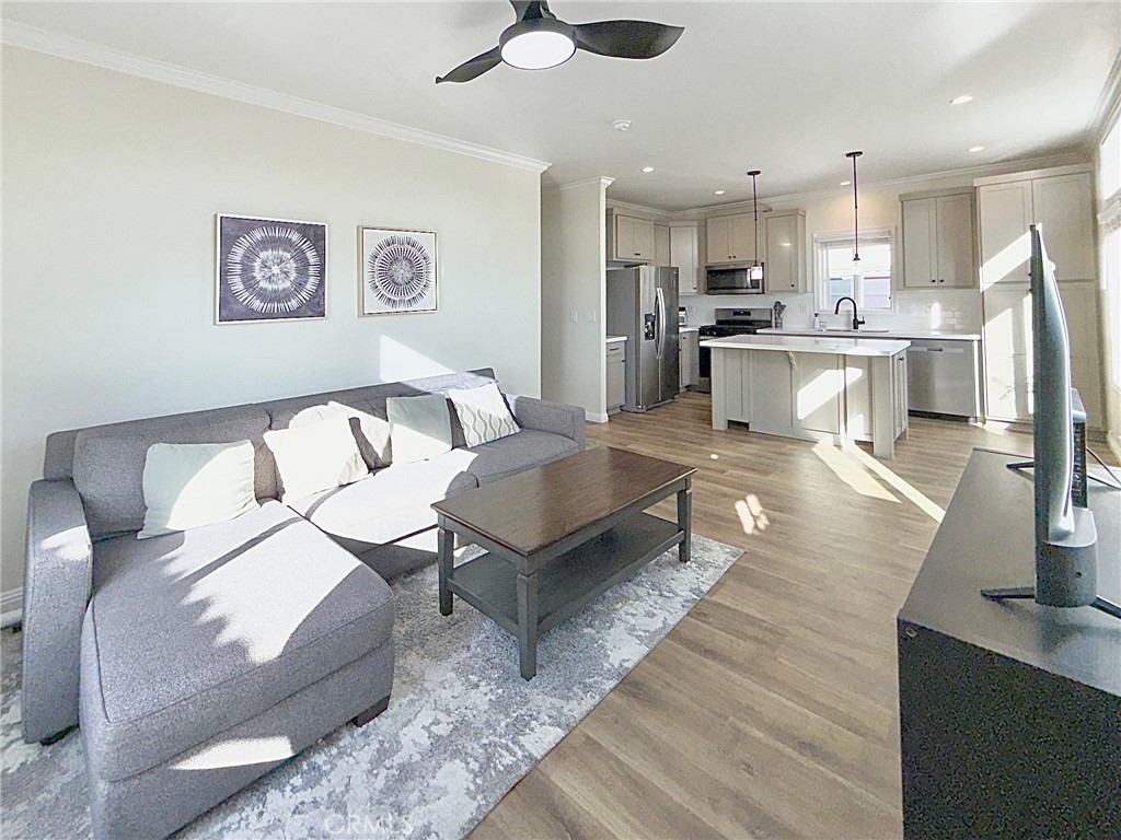 12530 Royal Road, Unit 46 El Cajon, CA 92021 - Photo 3 of 17 a living room with furniture and kitchen view