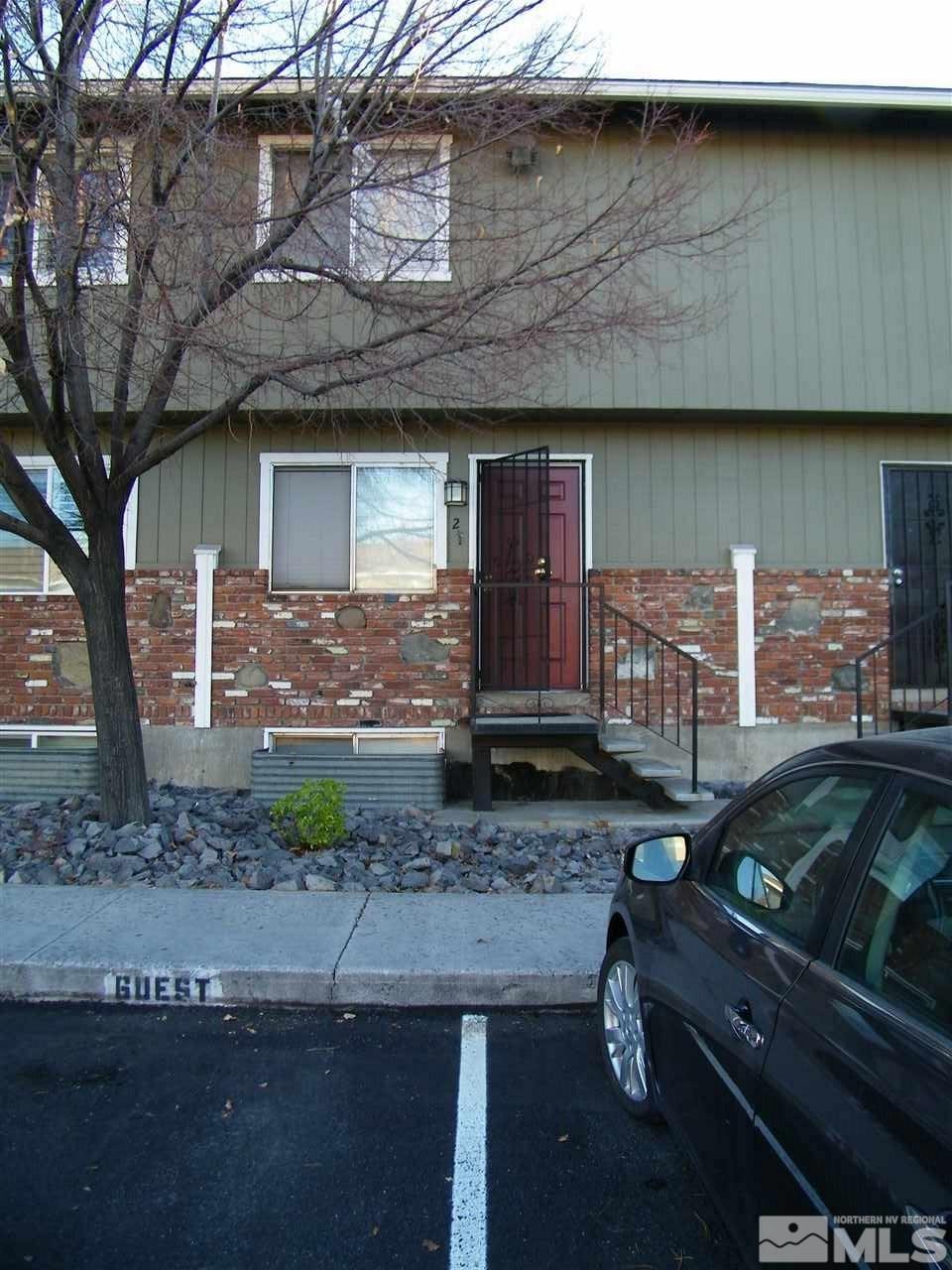 1408 East 9th Street, Unit 2 Reno, NV 89512 - Photo 1 of 10 a front view of a house with garden