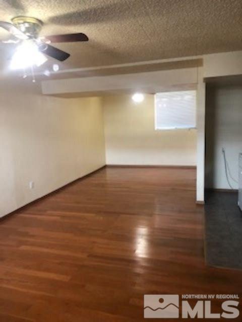 1408 East 9th Street, Unit 2 Reno, NV 89512 - Photo 6 of 10 a view of room with window and hardwood floor