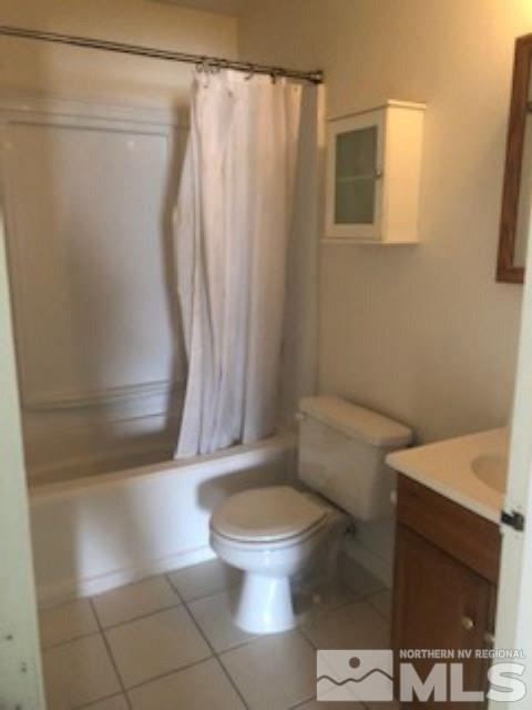 1408 East 9th Street, Unit 2 Reno, NV 89512 - Photo 10 of 10 a bathroom with a toilet and a shower
