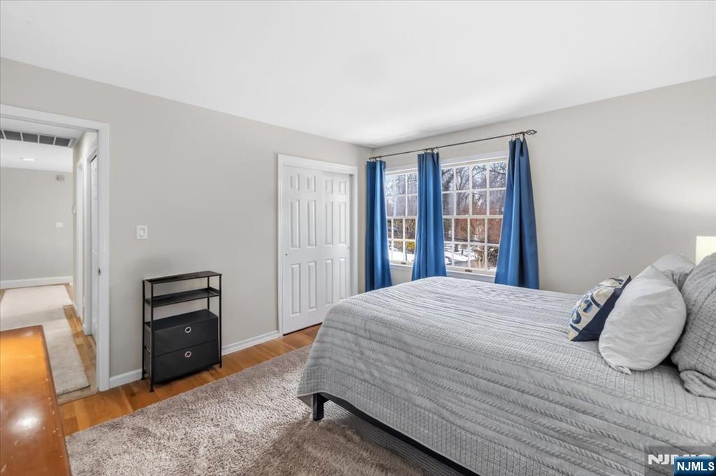 4 Lindeman Avenue Closter, NJ 07624 - Photo 23 of 36 a bedroom with a bed and a window