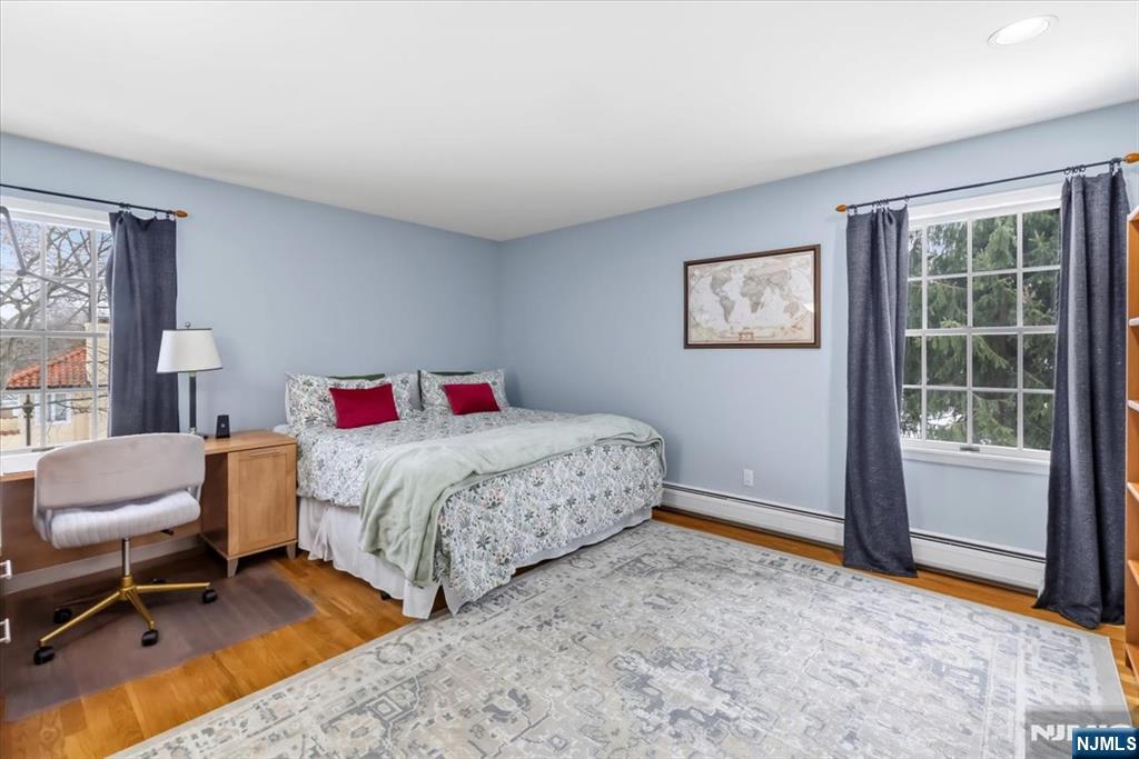 4 Lindeman Avenue Closter, NJ 07624 - Photo 25 of 36 a bedroom with a bed and a window