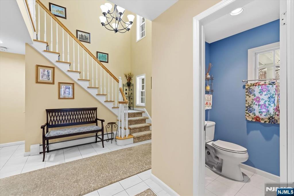 4 Lindeman Avenue Closter, NJ 07624 - Photo 4 of 36 a view of entryway with stairs and furniture