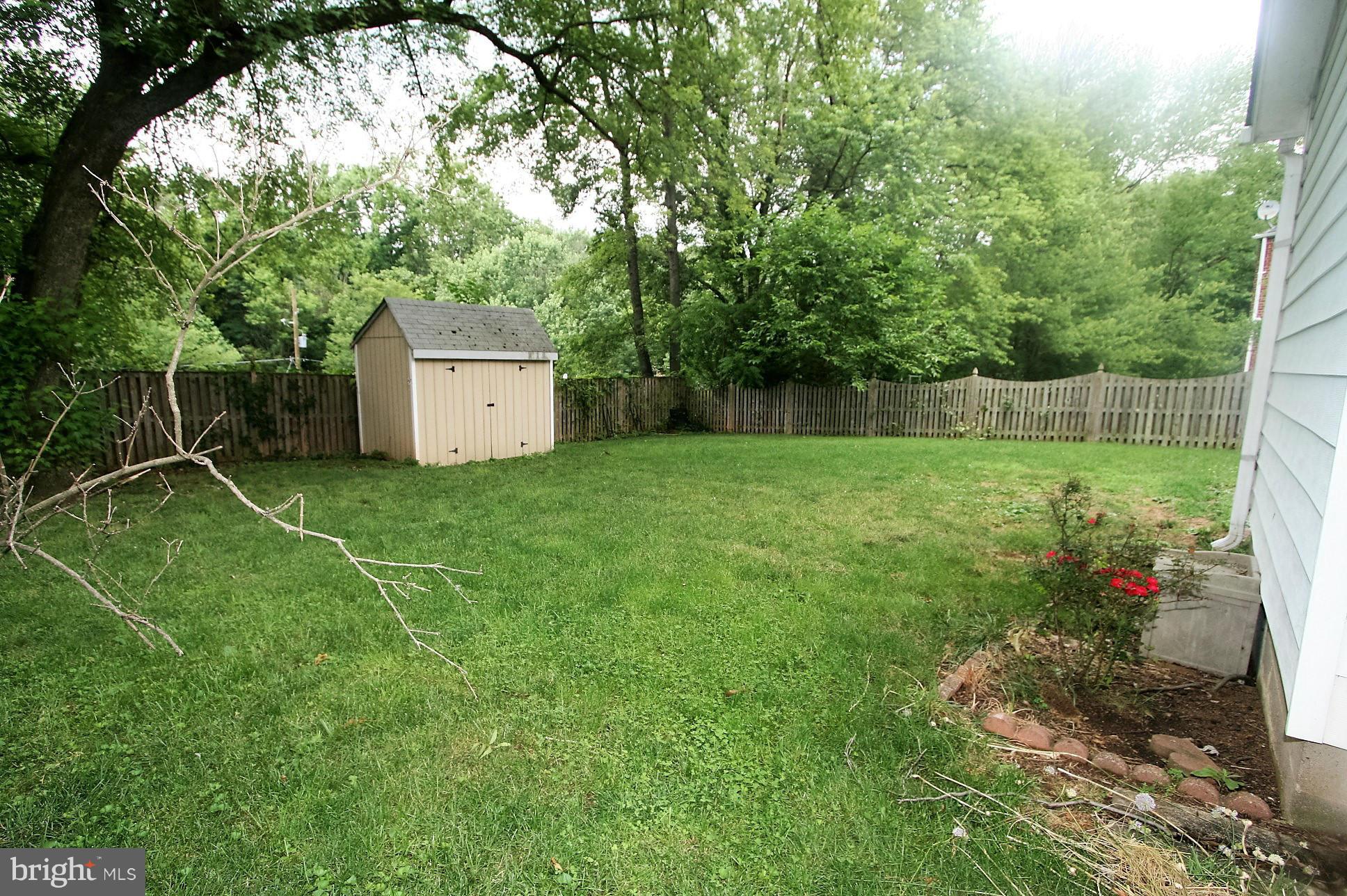 9626 Dilston Road Silver Spring, MD 20903 - Photo 30 of 30 Fenced yard with shed