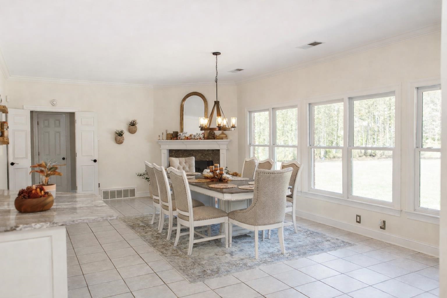 565 Schaeffer Loop Eads, TN 38028 - Photo 11 of 33 a dining room with furniture a window and chandelier