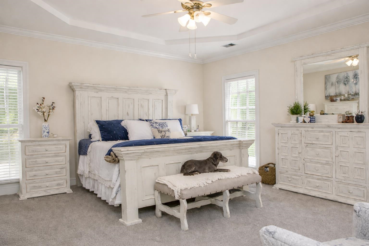 565 Schaeffer Loop Eads, TN 38028 - Photo 13 of 33 a bed room with a bed and a chandelier