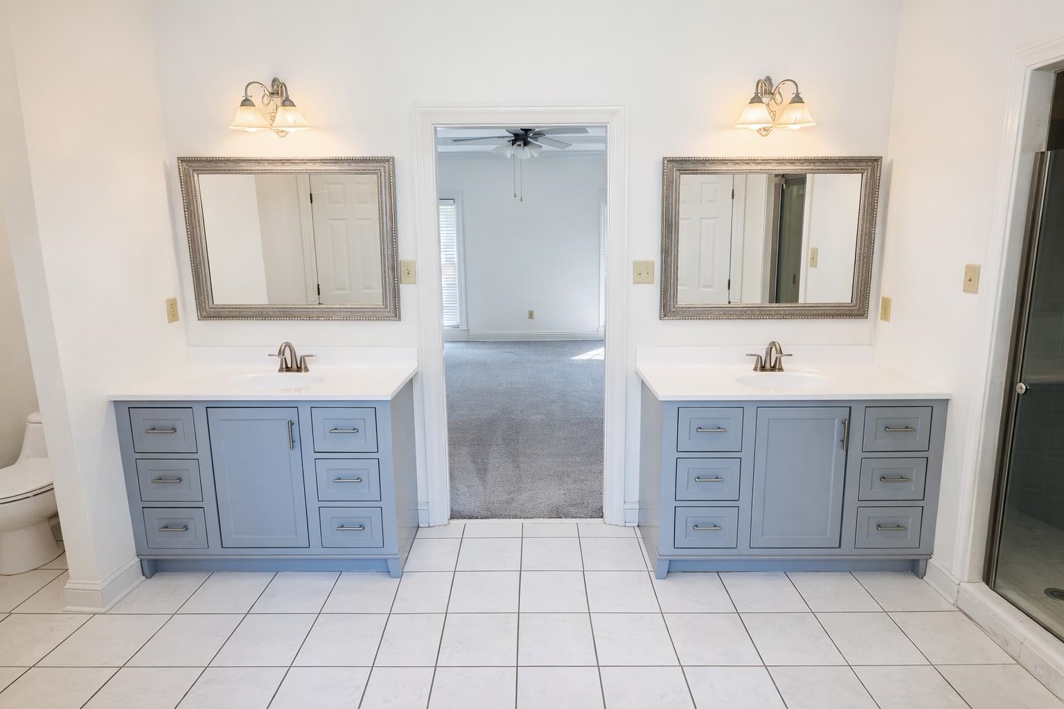 565 Schaeffer Loop Eads, TN 38028 - Photo 15 of 33 a bathroom with a sink vanity and mirror