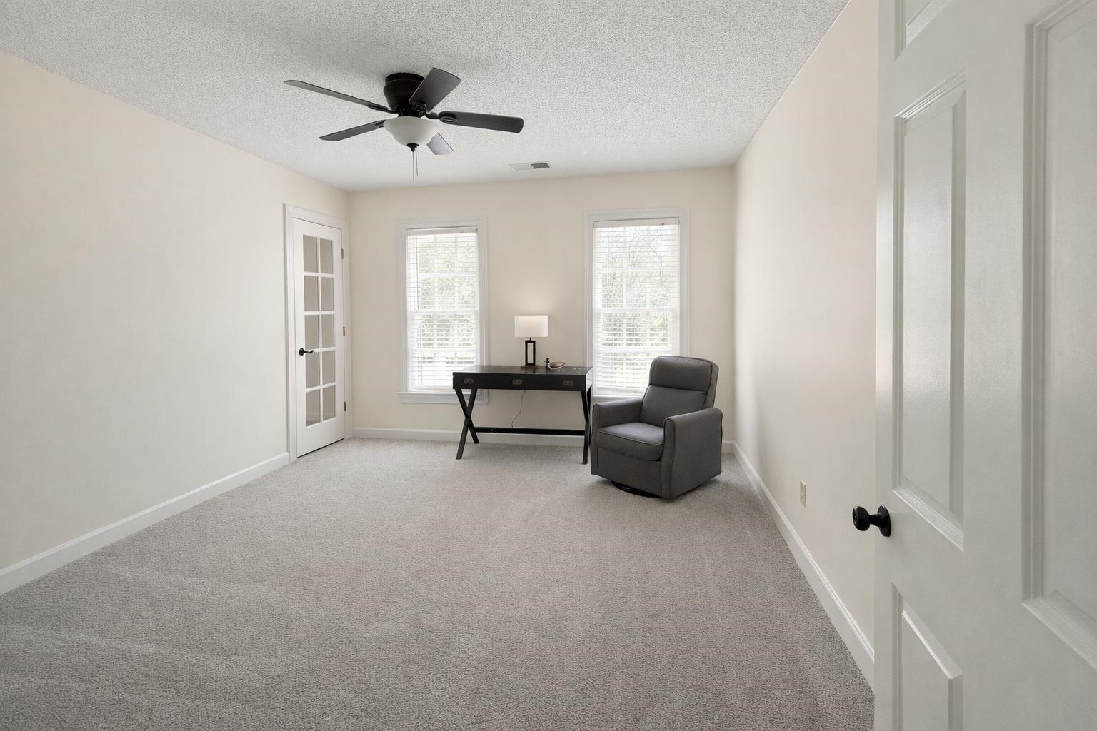 565 Schaeffer Loop Eads, TN 38028 - Photo 24 of 33 a living room with furniture and a ceiling fan